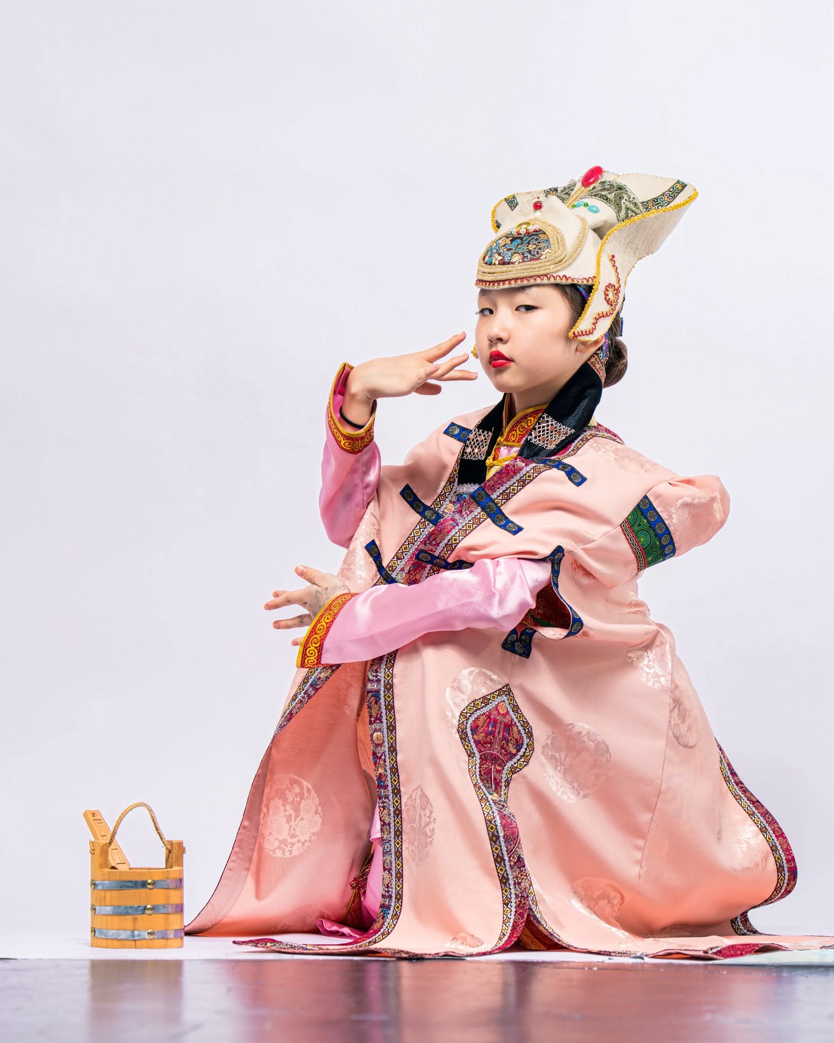 Young dancer in a pink traditional costume